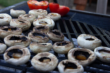 organic mushrooms and vegetables cooked on the barbecue
