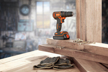 Screwdriver on table and interior of workshop. Empty space for your decoration. 