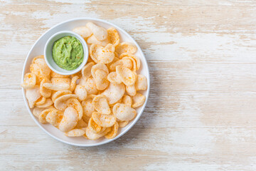 Fried shrimp cracker in thai style. Shrimp cracker with avocado dip