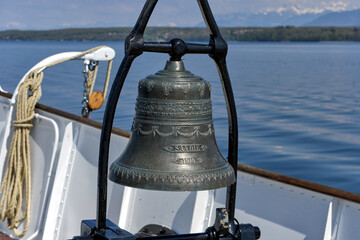 bell at the bow of a steamboat on Lake Geneva, Switzerland