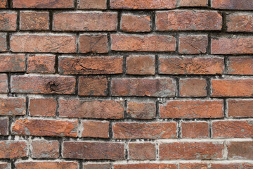 Fototapeta premium Red brick wall building exterior
