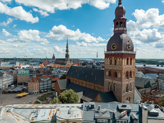 Fototapeta premium Aerial view of the Riga old town in Latvia. Beautiful historical buildings and Domes cathedral. Summer in Riga.