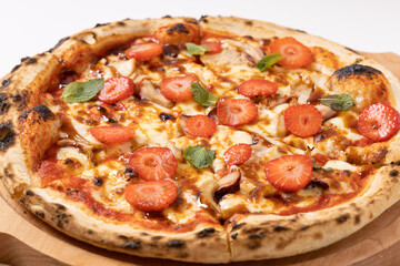 pizza with strawberries on a white background