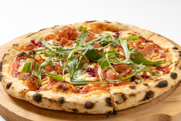 italian pizza with arugula on a white background