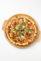 italian pizza with arugula on a white background