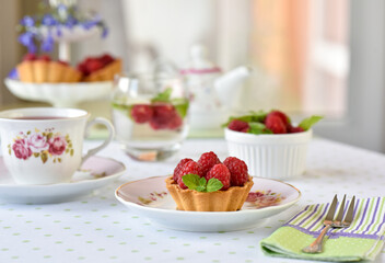Red berry mini tart cake on a table