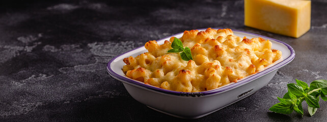 American mac and cheese, macaroni pasta in cheesy sauce