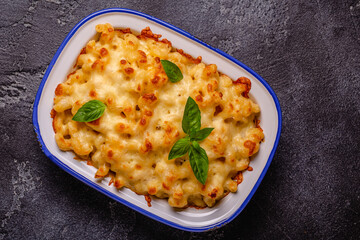 American mac and cheese, macaroni pasta in cheesy sauce
