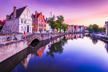 Fototapeta na wymiar Bruges, Belgium. Sunrise over Spiegelrei Canal, Flanders famous city.