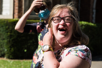 Portrait of a cute 38 year old girl with Down Syndrome