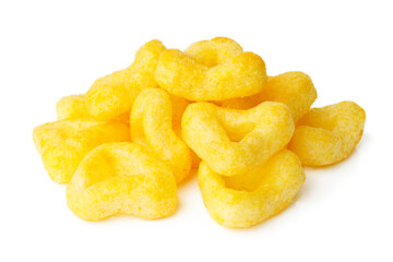 Yellow crispy beer snack made from corn in the shape of a triangle.