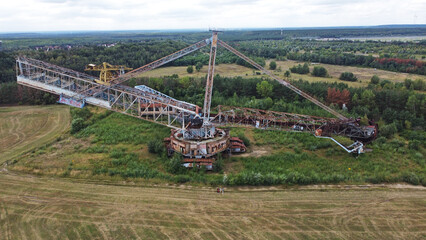 Fototapeta premium Views of decayed lignite bucket wheel excavator seen from drone