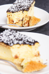 Portion of fresh baked cheesecake on plate. Delicious dessert