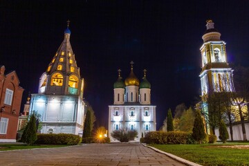 Old orthodox churches and belfry on the cathedral square in Kolomna, Russia at night