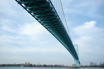 Scenic view of the Ambassador suspension bridge with its full length from below under the blue sky