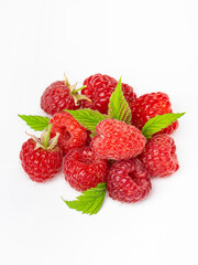 Ripe raspberries with leaf isolated on a white background