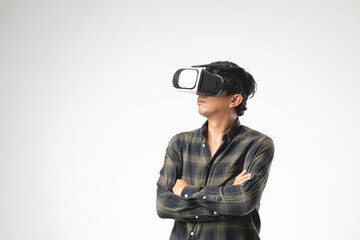 Asian handsome man with using virtual reality headset or VR glass isolate on gray background