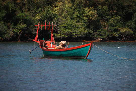 A traditional khmer fishing boat moored off the coast of Koh Tonsay or Rabbit Island in Cambodia