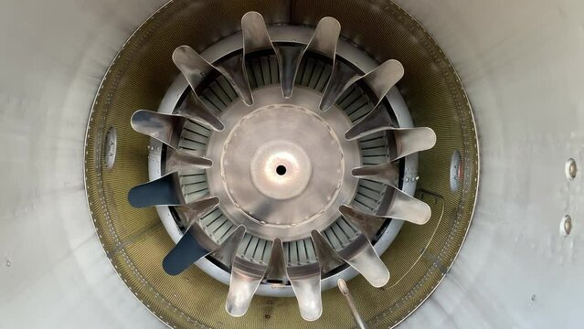 Internal View Jet Engine Exhaust with Spinning Turbine Blade and Mixer