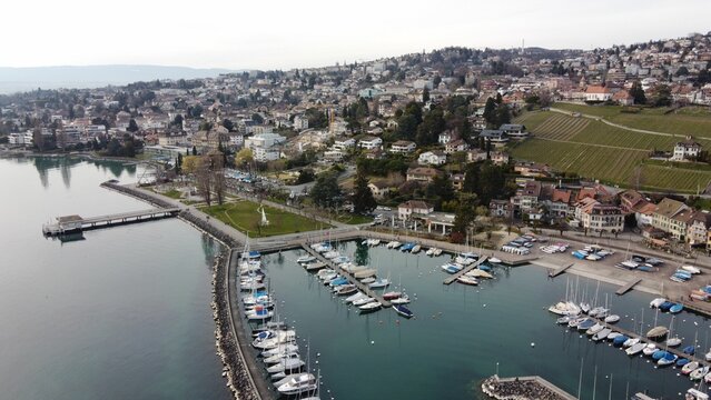 Aerial shot of the Port Lutry against a blue sea in Lausanne, Switzerland