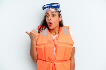 hispanic woman looking astonished in disbelief. life jacket and summer concept