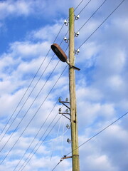 Old wooden power line pole