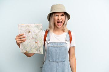 blonde woman shouting aggressively, looking very angry. tourist and map concept