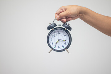 male hand holding a watch on a white background