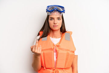 pretty girl feeling angry, annoyed, rebellious and aggressive. life jacket and summer concept