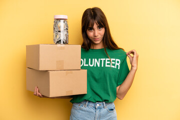 pretty woman looking arrogant, successful, positive and proud. volunteer and donation concept