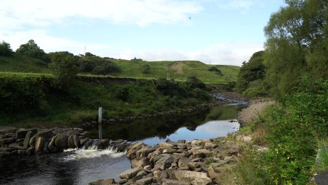 Scenic view of the weir on a flowing river in Dunbeath Strath, Scottish Highlands