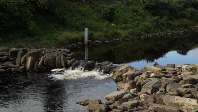 Scenic view of the weir on a flowing river in Dunbeath Strath, Scottish Highlands