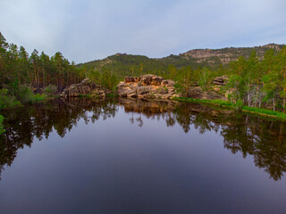 Lake Shaitankol meaning Devil's Lake . Karkaraly National Park in the Karaganda Region of Kazakhstan.