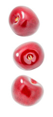 Cherries, three red cherry berries,  falling, hanging, flying, soaring, isolated on white background with clipping path