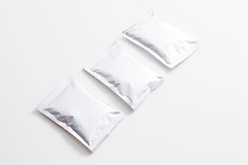 Blank sachets for supplements isolated on white background