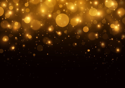 Gold bokeh blurred light. Abstract background with bokeh effect. Magic concept.