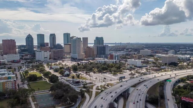 Downtown Tampa and highway traffic with moving sunshine