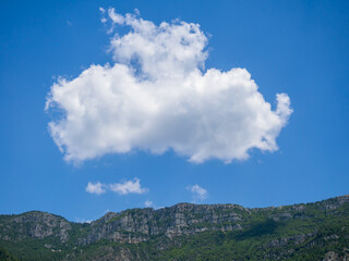 white clouds over the mountains