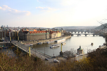 Fototapeta na wymiar Prague Czech Republic high angle view from north of the city with bridges and Vltava river at sunset