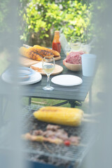Chef cooking by grilling to wait for camping activity