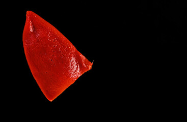 Piquillo peppers on black background. Copy space.