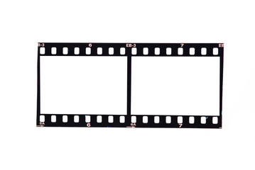 Old 35mm filmstrip or dia slide frame isolated on white background.