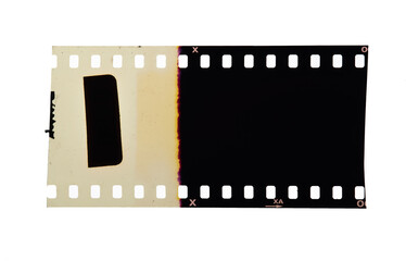 Old 35mm filmstrip or dia slide frame isolated on white background.
