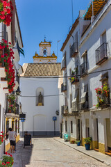 Fototapeta na wymiar White houses and San Basilio church in Cordoba, Spain