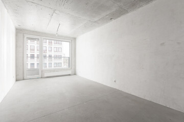 interior of the apartment without decoration in gray colors. rough finish
