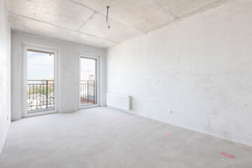 interior of the apartment without decoration in gray colors. rough finish