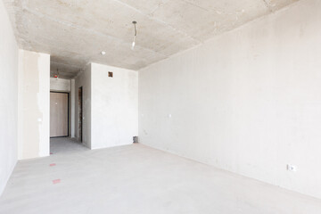 interior of the apartment without decoration in gray colors. rough finish