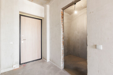 interior of the apartment without decoration in gray colors. rough finish