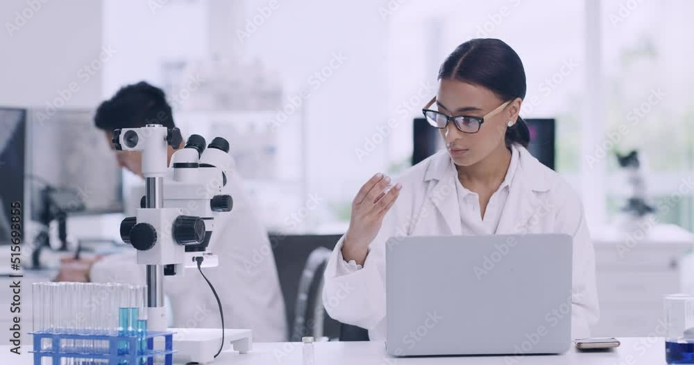 Poster Genetic engineer, biochemist, pathologist thinking and using technology to discover cure. Scientist using laptop and checking monkeypox vial sample while recording and researching chemical reactions.