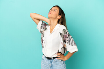 Young woman over isolated blue background with neckache